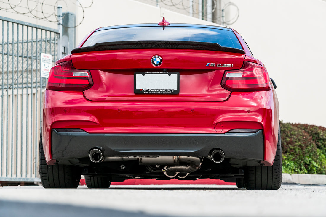 Rear view of a BMW M235i with the ARK DT-S Exhaust System installed.