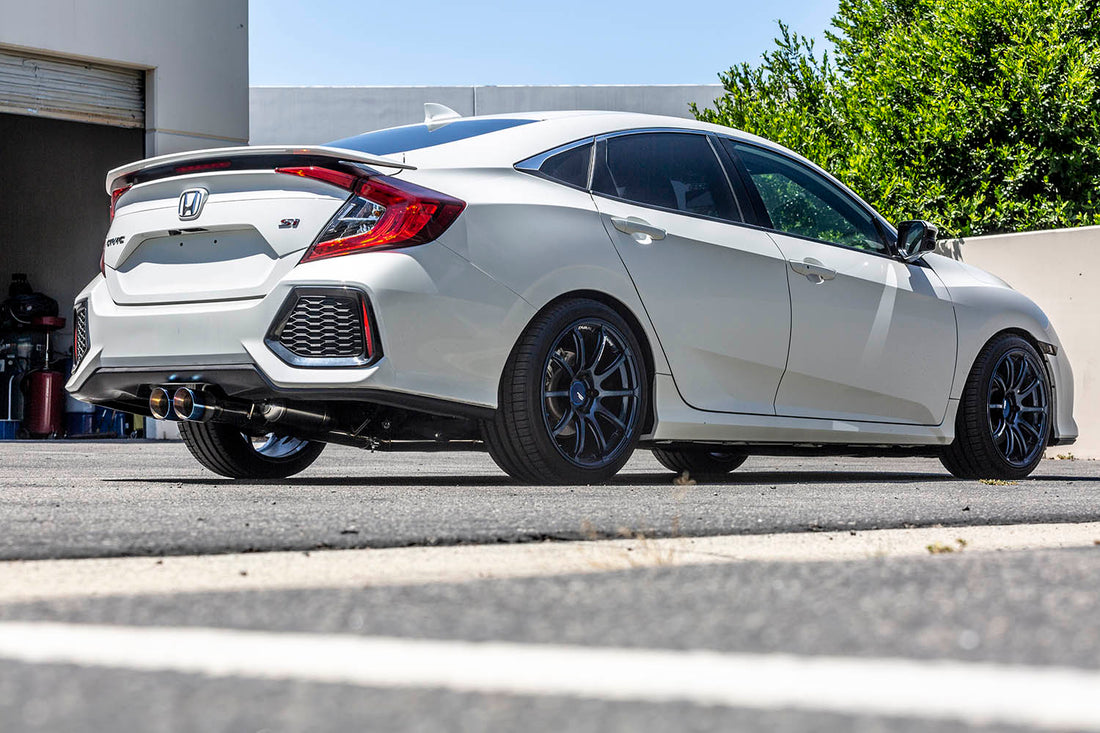 White Civic SI Sedan with our ARK DT-S Exhaust with burnt tips.