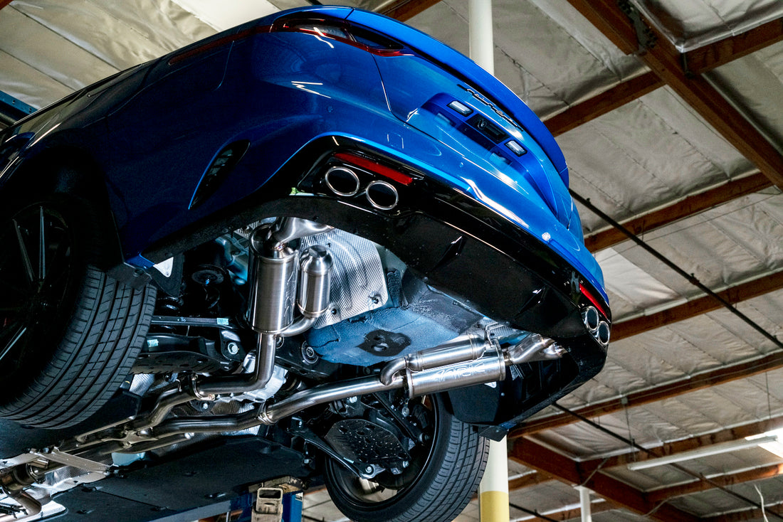 A view from below of the best exhaust for the Kia Stinger. ARK GRiP Exhaust