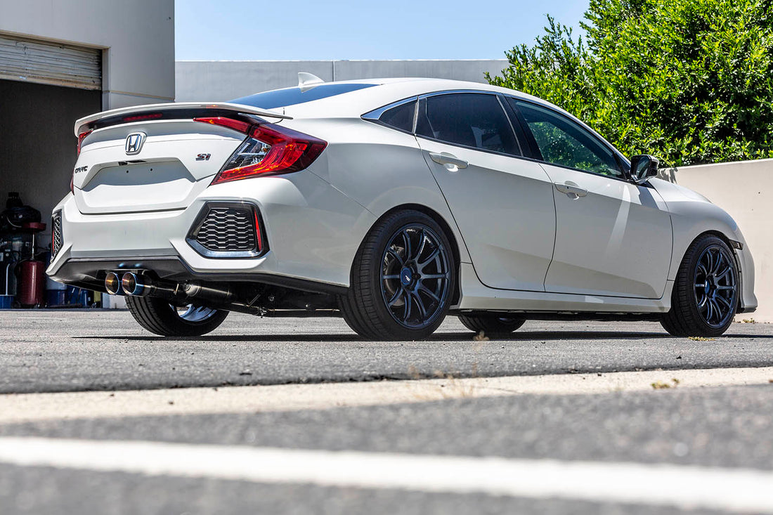 White Civic SI Sedan with our ARK DT-S Exhaust with burnt tips. 