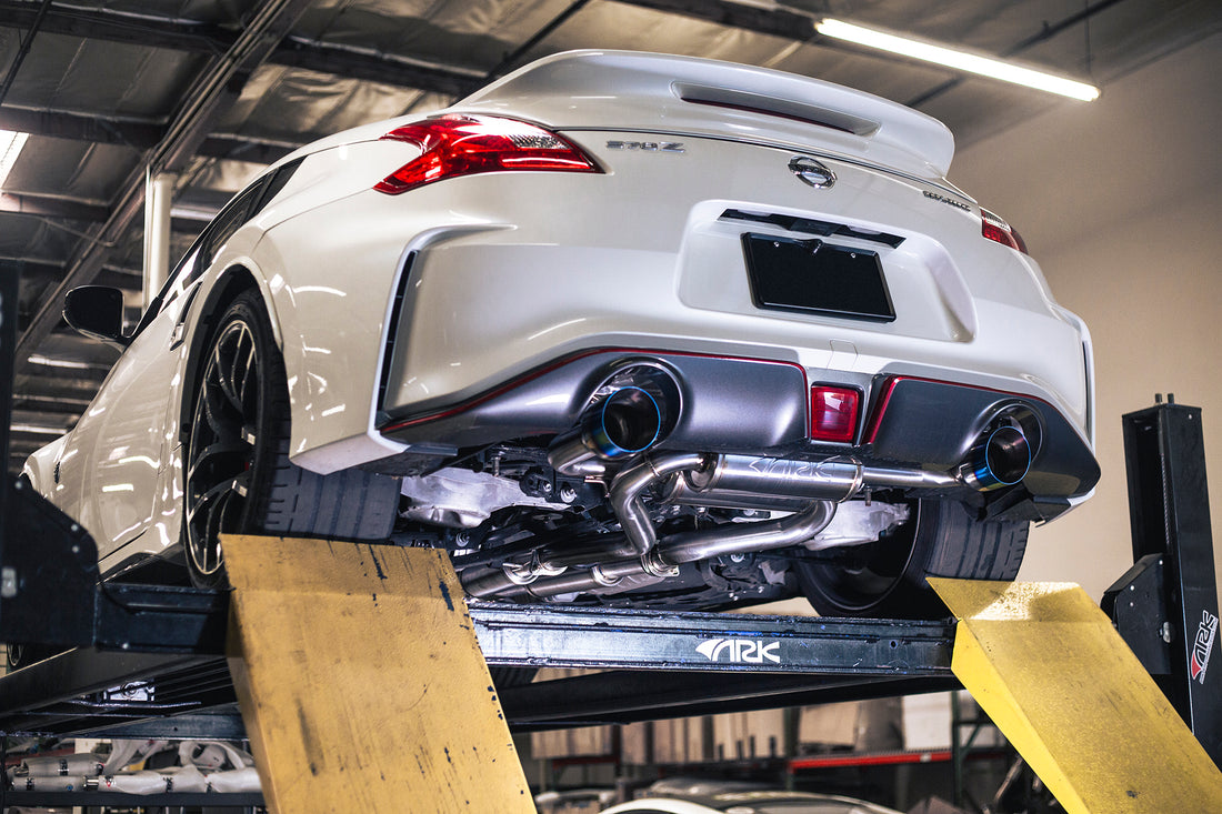 A view from below of the ARK DT-S Exhaust System for the Nissan 370z